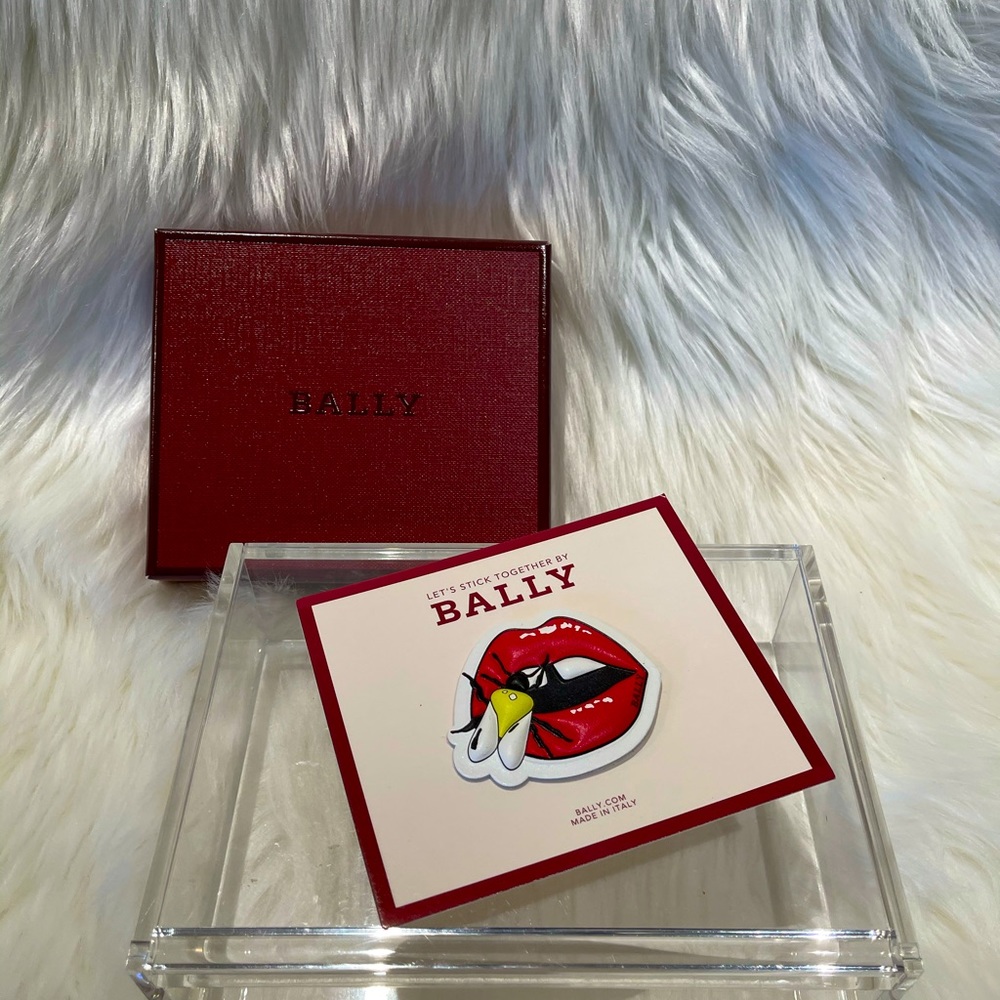 Bally leather red lips with bee sticker.